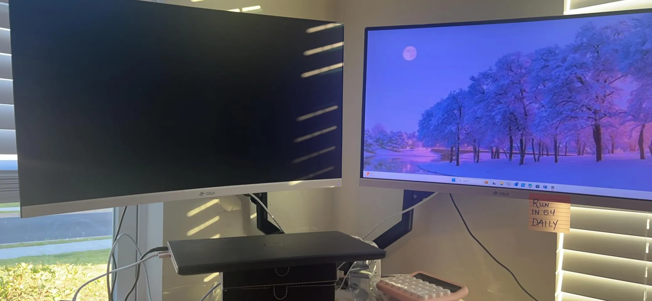 The monitor also supports VESA mounting (100x100) if you prefer to use an adjustable arm for positioning.